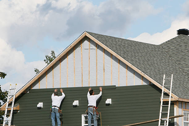 Professional Emergency Siding Repair technician working in Shreve, OH